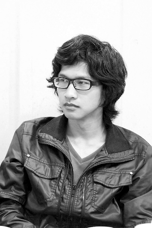 就读于中山大学管理学院会计学系2008级的王旋准备休学一年,去寻找自己的理想。信息时报记者 巢晓 摄 就读于中山大学管理学院会计学系2008级的王旋准备休学一年,去寻找自己的理想。信息时报记者 巢晓 摄